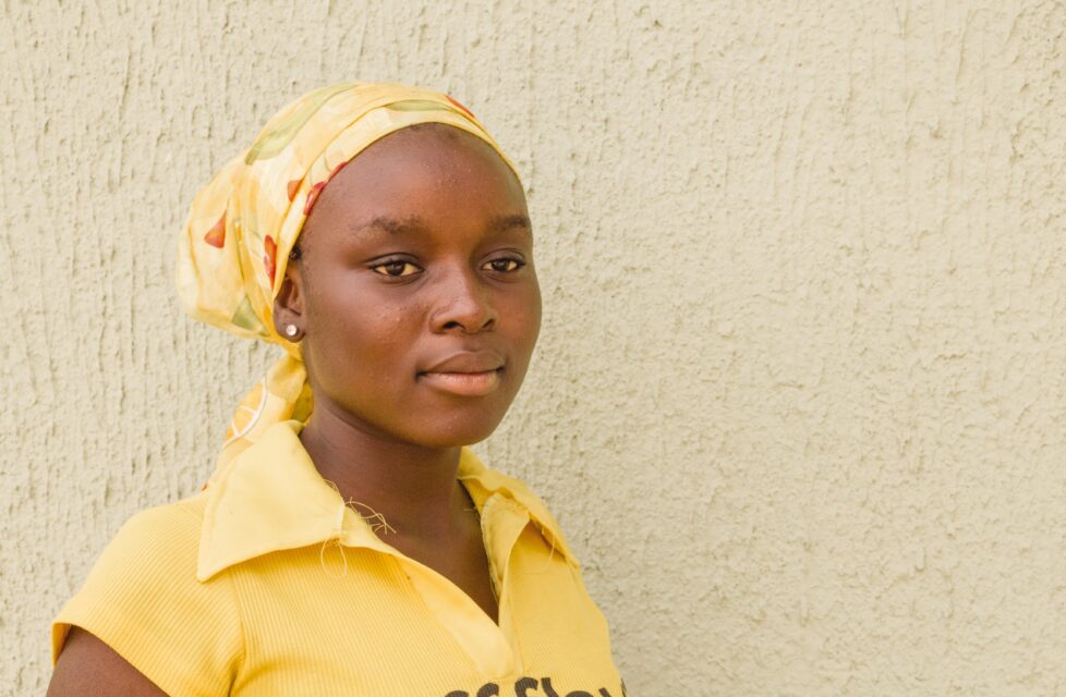 Nigerian Woman Kidnapped, Brainwashed by Boko Haram picture of mary outside her house