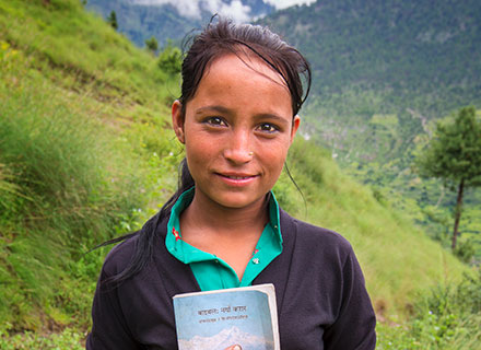 Young woman holding bible